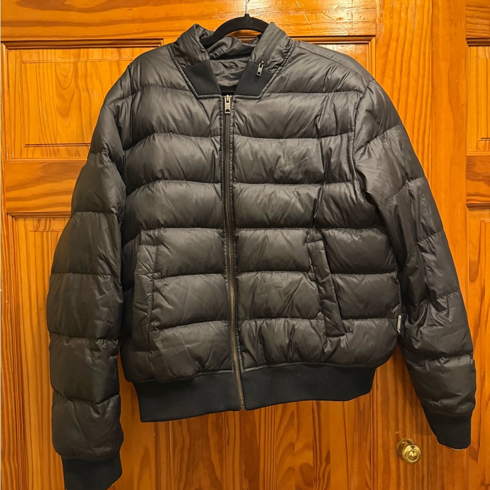 Bomber jacket with hidden hood